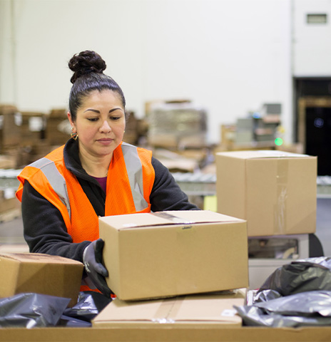 Employee working in a Supply Chain Outsourcing warehouse.