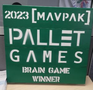 Painted pallet that says 2023 Brain Game Winners